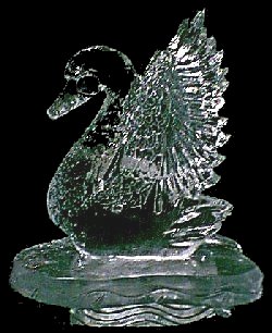 Click on image to view full size [Image - ½ block swan table centerpiece]